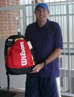 Lucky Draw winner, David Williams, holding his Wilson Prize Pack